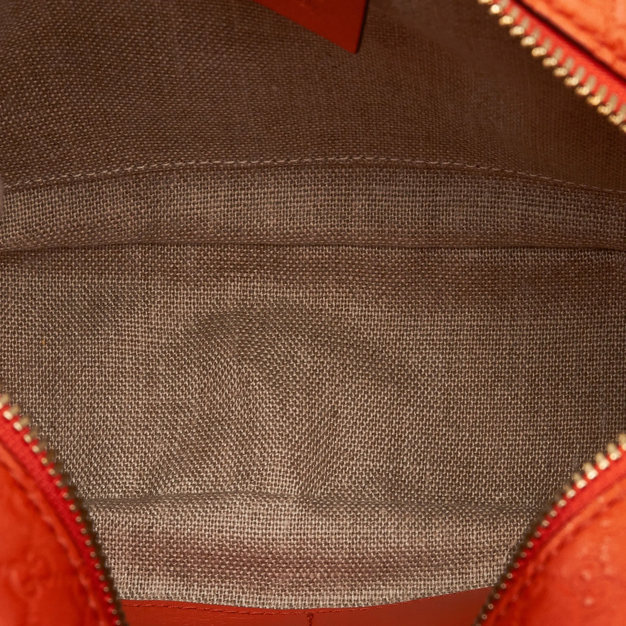 Gucci Bree Orange Microguccisima Embossed Leather