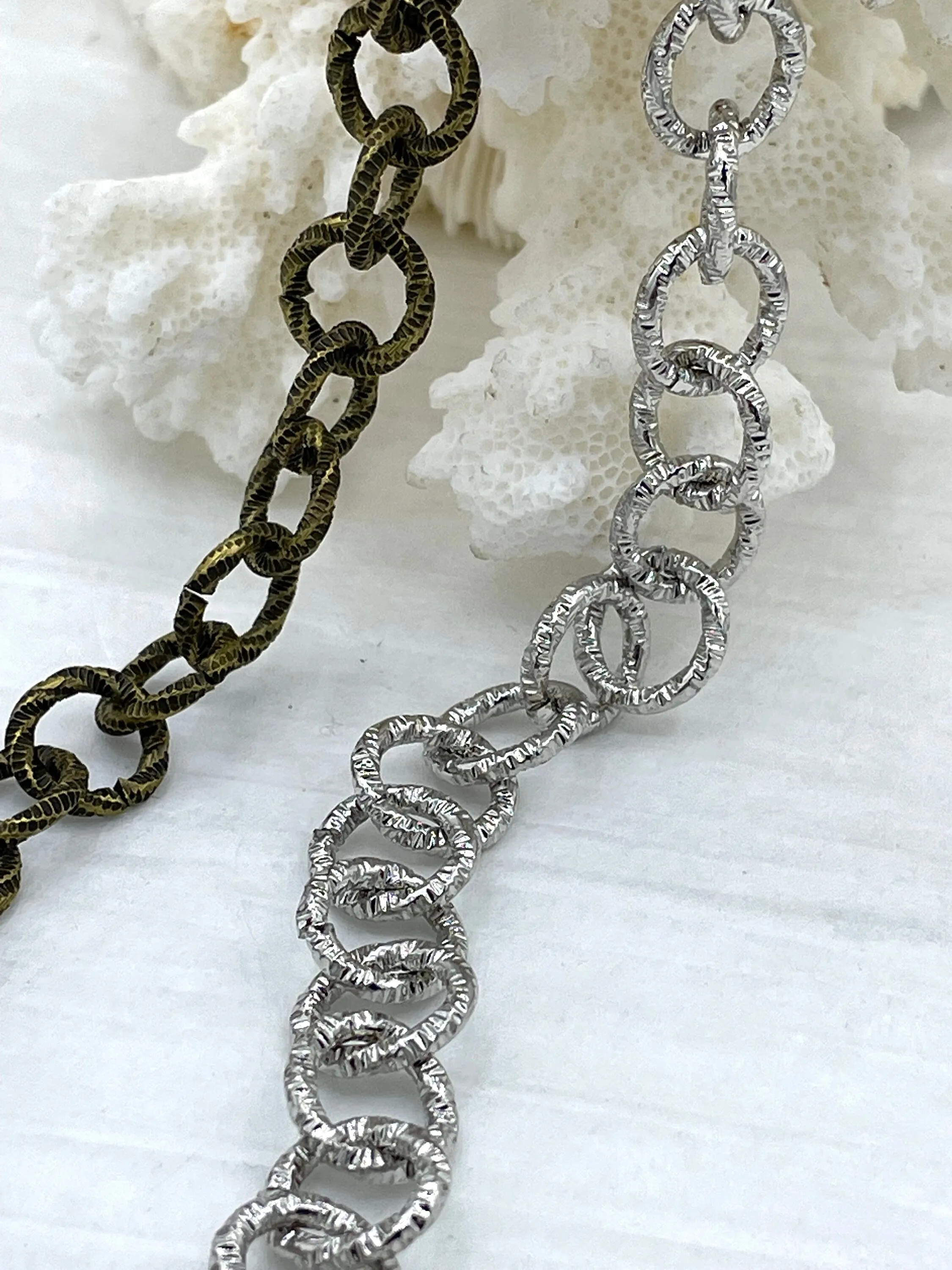 Textured Cable Rolo Chain Round sold by the foot. 10.5mm x 1.9mm links. Rolo Chain, Electroplated Base Metal, 2 finishes. Fast ship
