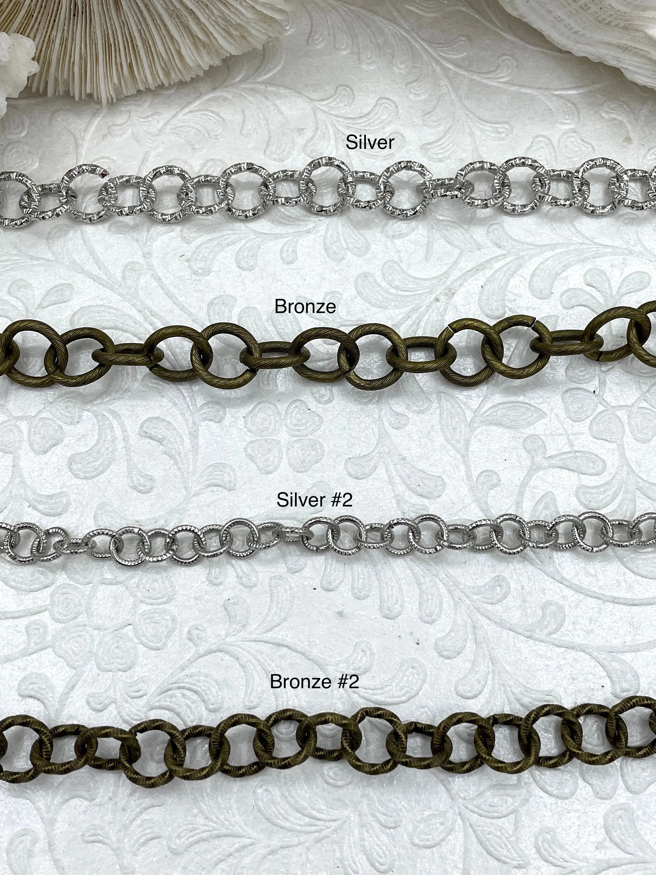 Textured Cable Rolo Chain Round sold by the foot. 10.5mm x 1.9mm links. Rolo Chain, Electroplated Base Metal, 2 finishes. Fast ship